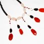 ST430       Rose Quartz, Carnelian and Onyx  Necklace in Sterling Silver