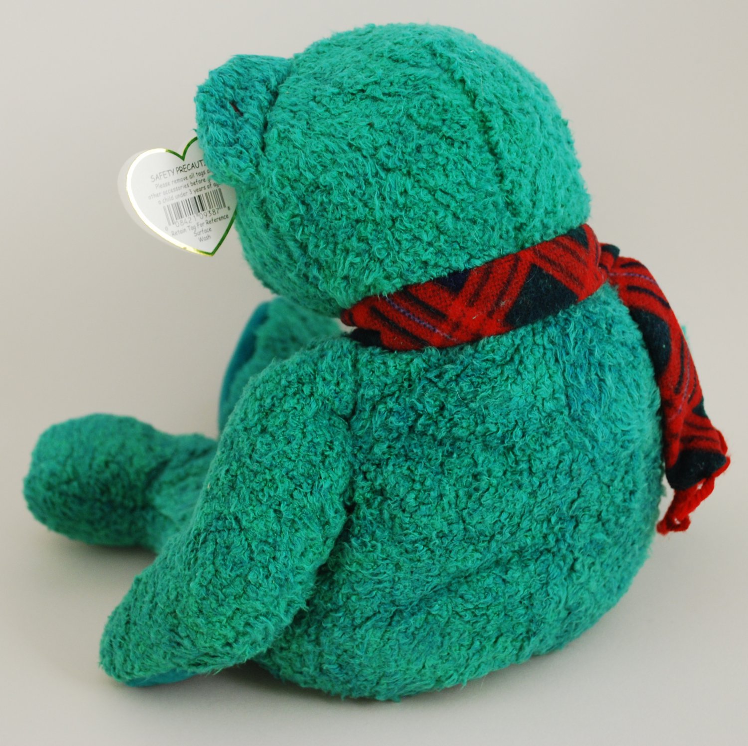 green buddy plush doll