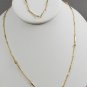 1984 Avon Simulated Diamond Accent in Goldtone Necklace and Bracelet Set