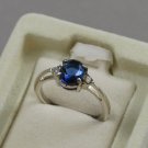 1985 Avon Simulated Sapphire Blue Elegance Ring Silver Tone Setting Size 7