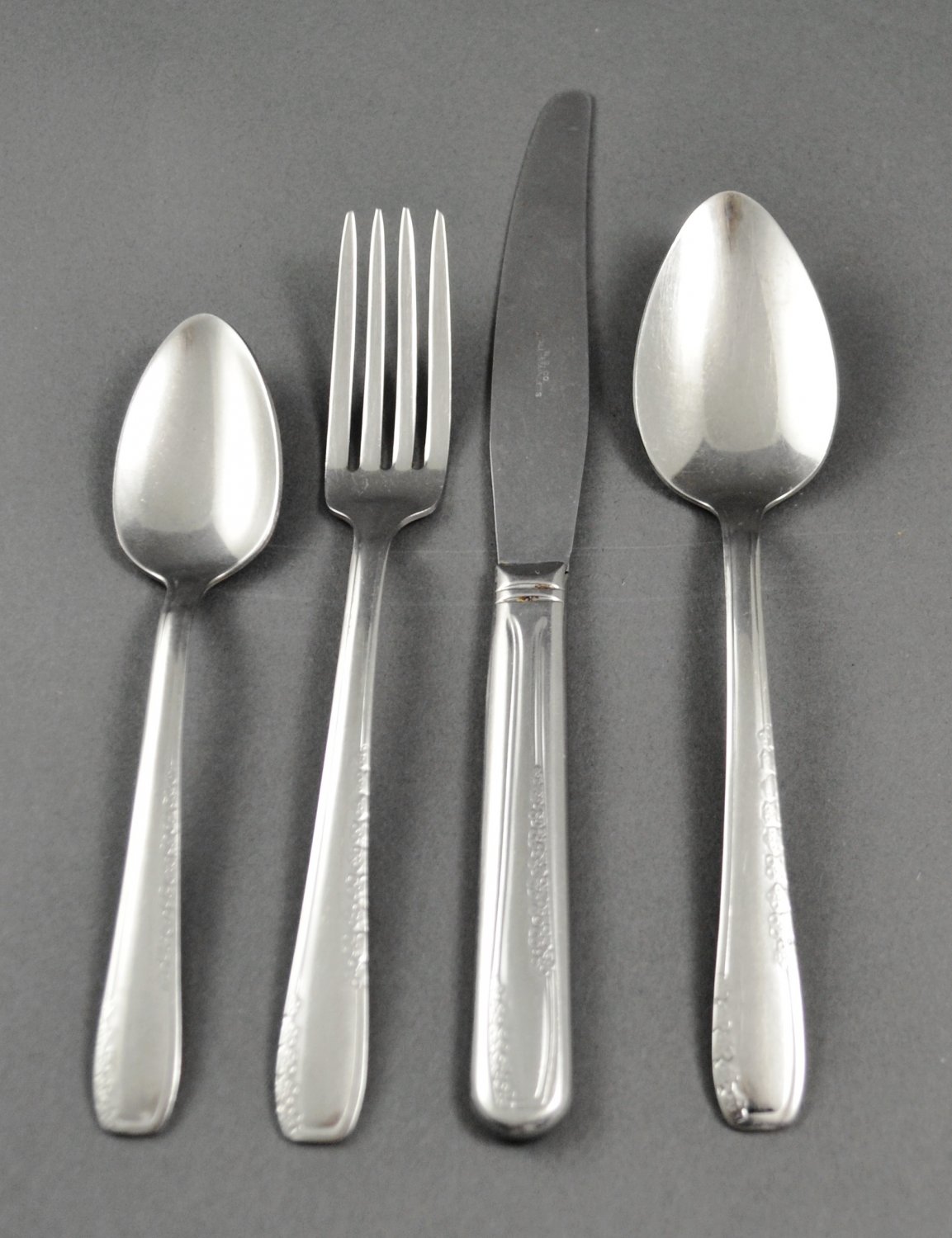 Five National Stainless Flatware Pattern NST86 4-Piece Place Settings