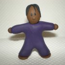 Adult, male, dark skin, black hair