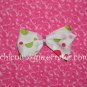 Adorable Boutique Multi-Colored Polka Dots on an alligator clip