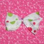 Adorable Boutique Multi-Colored Polka Dots on an alligator clip