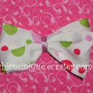Adorable Boutique Multi-Colored Polka Dots on an alligator clip